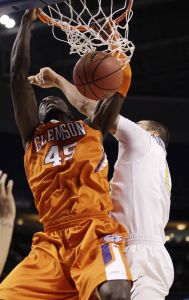Clemson's Jerai Grant (45) dunks the ball as West Virginia's Cam Thoroughman defends, during the first half of an East regional second round NCAA tournament college basketball game in Tampa, Fla., Thursday, March 17, 2011. (AP Photo/Chris O'Meara)