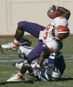 Sadat Chambers is tackled by Duke's Wesley Oglesby during the second half. (AP Photo/Gerry Broome)