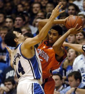 Clemson's David Potter is pressured by Duke's David McClure (14) in the first half of a basketball game in Durham, N.C., Saturday, Jan. 19, 2008. Duke won 93-80 over Clemson.