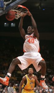 Clemson's James Mays dunks the ball as West Virginia's Darris Nichols looks on in the first half. (AP Photo/Frank Franklin II)