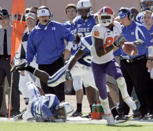 Aaron Kelly, right, steps out-of-bounds as Duke's Eddie Morgan, left, tries to make the tackle during the first half. (AP Photo/Gerry Broome)