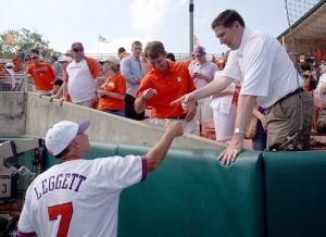 Head Coach Jack Leggett accepts congratulations from Head Coaches Brad Brownell and Dabo Swinney following the Tiger victory.