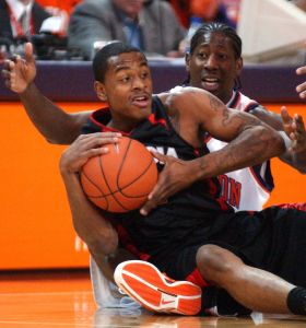 Georgia guard Levi Stukes looks to pass the ball after he and Clemson forward James Mays dove for a loose ball in the first half of a basketball game Thursday, Dec. 28, 2006, in Clemson, S.C. (AP Photo/The Anderson Independent-Mail, Sefton Ipock)