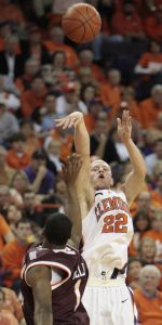 Terrence Oglesby shoots a three point shot over Virginia Tech's Terrell Bell during the first half. (AP Photo/Patrick Collard)