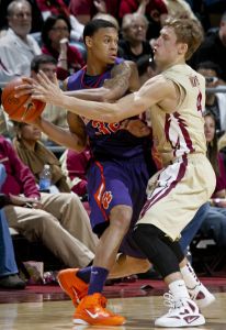 Clemson guard K.J. McDaniels (32) is pressured by Florida State's Deividas Dulkys (4) in the second half. (AP Photo/Phil Sears)