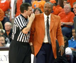 Clemson coach Oliver Purnell, right, reacts while official Joe Lindsay explains a call during the first half of an NCAA basketball game against Georgia Tech on Tuesday, March 2, 2010 at Littlejohn Coliseum in Clemson, S.C. (AP Photo/Anderson Independent-Mail, Mark Crammer)