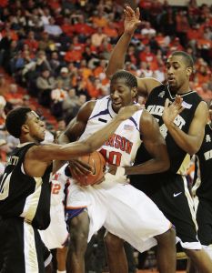 James Mays tries to shoot as he gets pressure from Wake Forest defenders Ishmael Smith, left, and David Weaver during the first half of the baketball game in Clemson, S.C., Tuesday, Jan. 22, 2007. (AP Photo/Patrick Collard)