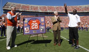 C.J. Spiller, President James F. Barker and Athletic Director Dr. Terry Don Phillips
