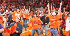 students rush court celebrate