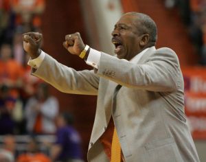 Clemson coach Oliver Purnell gestures to his players from the sidelines during the first half of an NCAA college basketball game against North Carolina on Wednesday, Jan. 13, 2010, in Clemson, S.C. (AP Photo/Mary Ann Chastain)