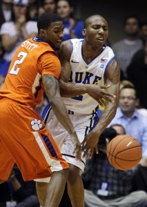 Duke's Nolan Smith, right, is guarded by Clemson's Demontez Stitt (2) during the second half an NCAA college basketball game in Durham, N.C., Wednesday, March 2, 2011. (AP Photo/Gerry Broome)