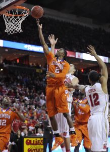 Clemson guard Demontez Stitt (2) goes to the basket against Maryland guard Terrell Stoglin (12) during the first half of an NCAA college basketball game, Saturday, Jan. 22, 2011, in College Park, Md. (AP Photo/Nick Wass)