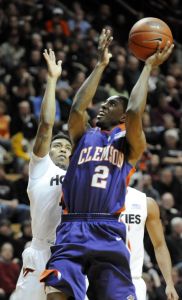 Demontez Stitt goes to the basket against the defense of Virginia Tech's A.D. Vassallo during the first half.