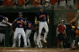 team dugout celebrate