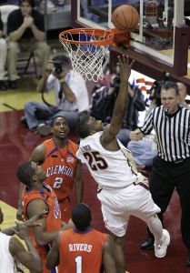 Florida State's Jason Rich scores after being fouled by Clemson's Trevor Booker, middle at left, during the second half of a basketball game Tuesday, Feb. 19, 2008, in Tallahassee, Fla. Also defending for Clemson are K.C. Rivers (1) and Demontez Stitt (2). Florida State won 64-55. (AP Photo/Steve Cannon)