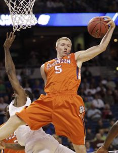 Clemson's Tanner Smith (5) grabs a rebound against West Virginia during the first half of an East regional second round NCAA tournament college basketball game in Tampa, Fla., Thursday, March 17, 2011. (AP Photo/John Raoux)