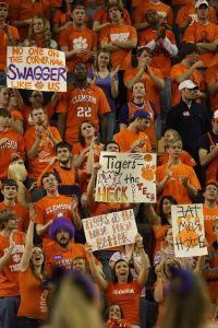 students cheer signs