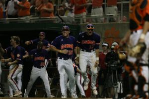team dugout celebrate