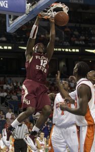 Florida State's Al Thornton (12) dunks over Clemson's K.C. Rivers (1) during the fiirst half of a first round game of the Men's Atlantic Coast Conference basketball tournament in Tampa, Fla., Thursday, March 8, 2007. (AP Photo/John Raoux)
