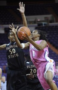 Lele Hardy shoots as Florida State's Jacinta Monroe defends during the second half in Clemson, S.C., Thursday, Feb. 19, 2009. (AP Photo/Patrick Collard)