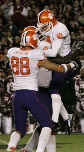 Clemson's Mark Buchholz, right, gets lifted into the air by temmates after kicking the game-winning field goal as time expired to defeated South Carolina 23-21 in a college football game Saturday, Nov. 24, 2007, at Williams Brice Stadium in Columbia, S.C. (AP Photo/Mary Ann Chastain)
