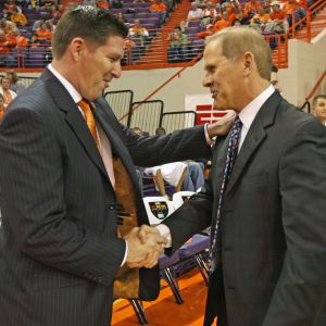 Clemson coach Brad Brownell, left, greets Michigan coach John Beilein before an ACC/Big Ten Challenge NCAA college basketball game at Littlejohn Coliseum in Clemson, S.C. on Tuesday, Nov. 30, 2010. (AP Photo/Anderson Independent-Mail, Mark Crammer)