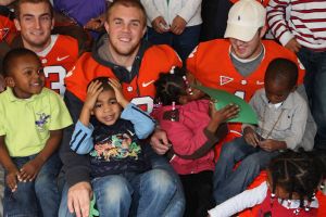 Members of the Clemson football team spent the morning of Monday, December 20 volunteering at Harvest Hope Food Bank in Greenville.