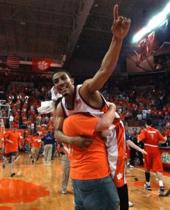 Vernon Hamilton celebrates as a fan picks him up at the end of Clemson's 74-70 win over Syracuse in the quarterfinals of the men's NIT tournament Wednesday, March 21, 2007. (AP Photo/Anderson Independent-Mail, Sefton Ipock)