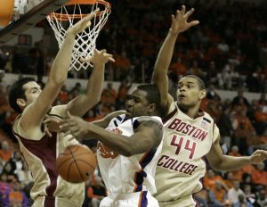 Clemson's Trevor Booker (35) battles for the rebound against Boston College's John Oates, left, and Tyrelle Blair(44) during the first half of their college basketball game Saturday, Feb. 2, 2008, at Littlejohn Coliseum in Clemson, S.C. (AP Photo/Mary Ann Chastain)