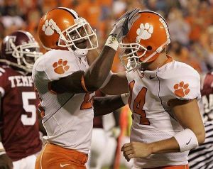 Clemson's C.J. Spiller (28) and quarterback Will Proctor (14) celebrate Spiller's touchdown during the first half of their football game against Temple Thursday, Oct. 12, 2006, at the Bank of America Stadium in Charlotte, N.C. (AP Photo/Mary Ann Chastain)
