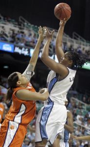 North Carolina's Erlana Larkins shoots over April Parker during the first half. (AP Photo/Nell Redmond)