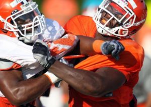 Corico Hawkins and Dwayne Allen practice 081011