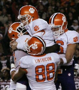 Clemson's Mark Buchholz (14) gets lifted into the air after making the winning field goal to defeat South Carolina 23-21 in a football game Saturday, Nov. 24, 2007, at Williams Brice Stadium in Columbia, S.C. (AP Photo/Mary Ann Chastain)