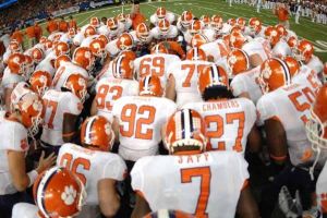 The Tigers huddle up during pregame.