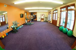 Wide angle photos of the interior rooms of the Penley Golf Facility