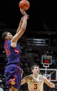 Clemson's Milton Jennings shoots in front of Florida State's Luke Loucks (3) in the second half. (AP Photo/Phil Sears)