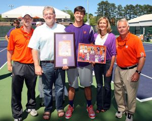 Senior Wes Moran with his parents and Assistant Coach John Boetsch and Head Coach Chuck McCuen