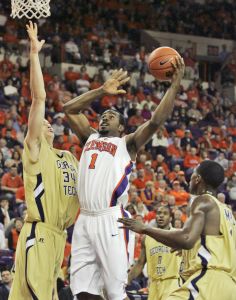 K.C. Rivers drives for the basket as Brad Sheehan defends during the first half.