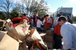 Members of the Clemson football team spent the morning of Monday, December 20 volunteering at Harvest Hope Food Bank in Greenville.