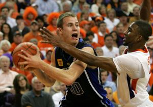 Duke's Jon Scheyer (30) looks for help as Clemson's Demontez Stitt (2) puts on the pressure during the first half of their NCAA college basketball game Saturday, Jan. 23, 2010, at Littlejohn Coliseum in Clemson, S.C. (AP Photo/Mary Ann Chastain)