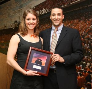 Assistant Coach Lance Asti and Rookie-of-the-Year Award Winner Elizabeth Savage