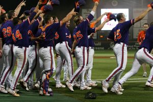 team celebrate on field