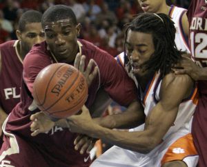 Florida State's Al Thornton, left, and Clemson's James Mays, right, grab for a rebound during a first round game of the Men's Atlantic Coast Conference basketball tournament in Tampa, Fla., Thursday, March 8, 2007. (AP Photo/John Raoux)