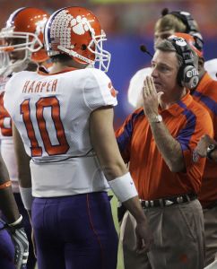 Clemson coach Tommy Bowden talks with quarterback Cullen Harper (10) during the first quarter of the Chick-fil-A Bow football game against Auburn on Monday, Dec. 31, 2007, in Atlanta. (AP Photo/John Bazemore)