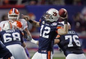 Auburn quarterback Brandon Cox throws a pass during the first quarter of the Chick-fil-A Bowl football game against Clemson on Monday, Dec. 31, 2007, in Atlanta. (AP Photo/John Bazemore)