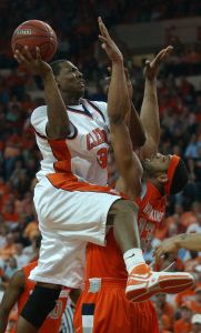 Sam Perry shoots over Syracuse's Darryl Watkins in the second half of their NIT quarterfinal game Wednesday, March 21, 2007. Clemson won 74-70. (AP Photo/Anderson Independent-Mail, Sefton Ipock)