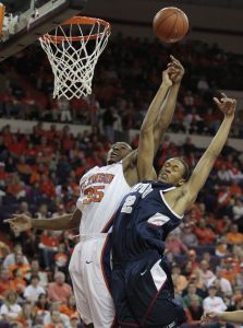Clemson's Trevor Booker, left, battles for a rebound against Samford's Savoy Fraine during the first half of the baketball game in Clemson, S.C., Saturday, Dec. 29, 2007. (AP Photo/Patrick Collard)