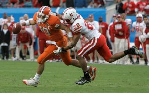 Nebraska defensive back Eric Hagg, right, sacks Clemson quarterback Cullen Harper during the fourth quarter of the Gator Bowl. (AP Photo/Phil Coale)