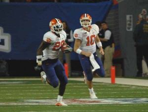Cullen Harper hands the ball off to C.J. Spiller leading to Spiller's 83-yard rushing touchdown.