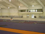 Indoor Track Facility Surface Installation Begins